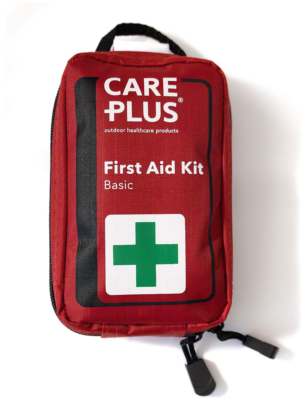A red zippered pouch labeled First Aid Kit with a green cross, for storm prep in Hiawatha, IA